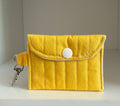 Yellow AirPods case