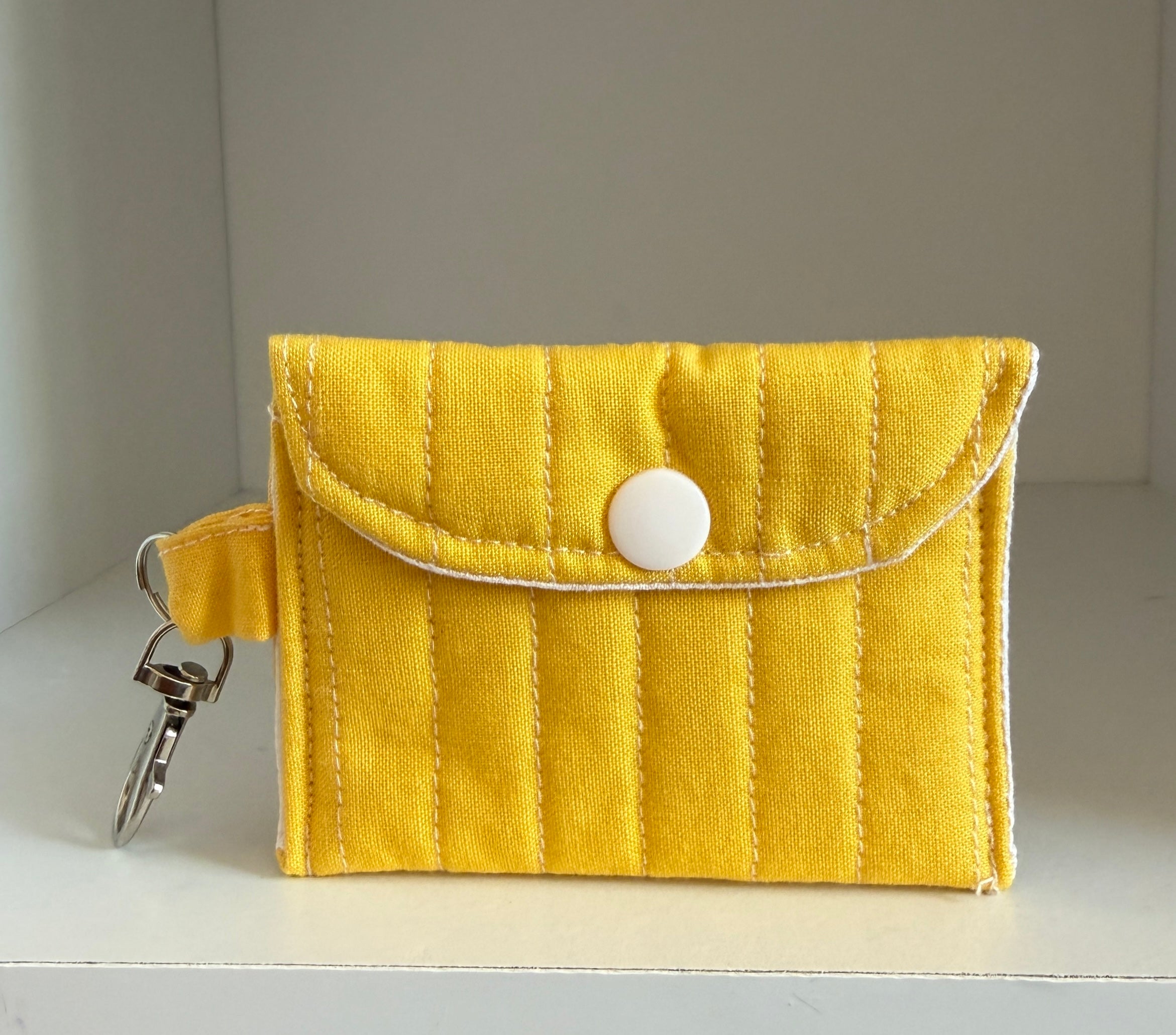 Yellow AirPods case