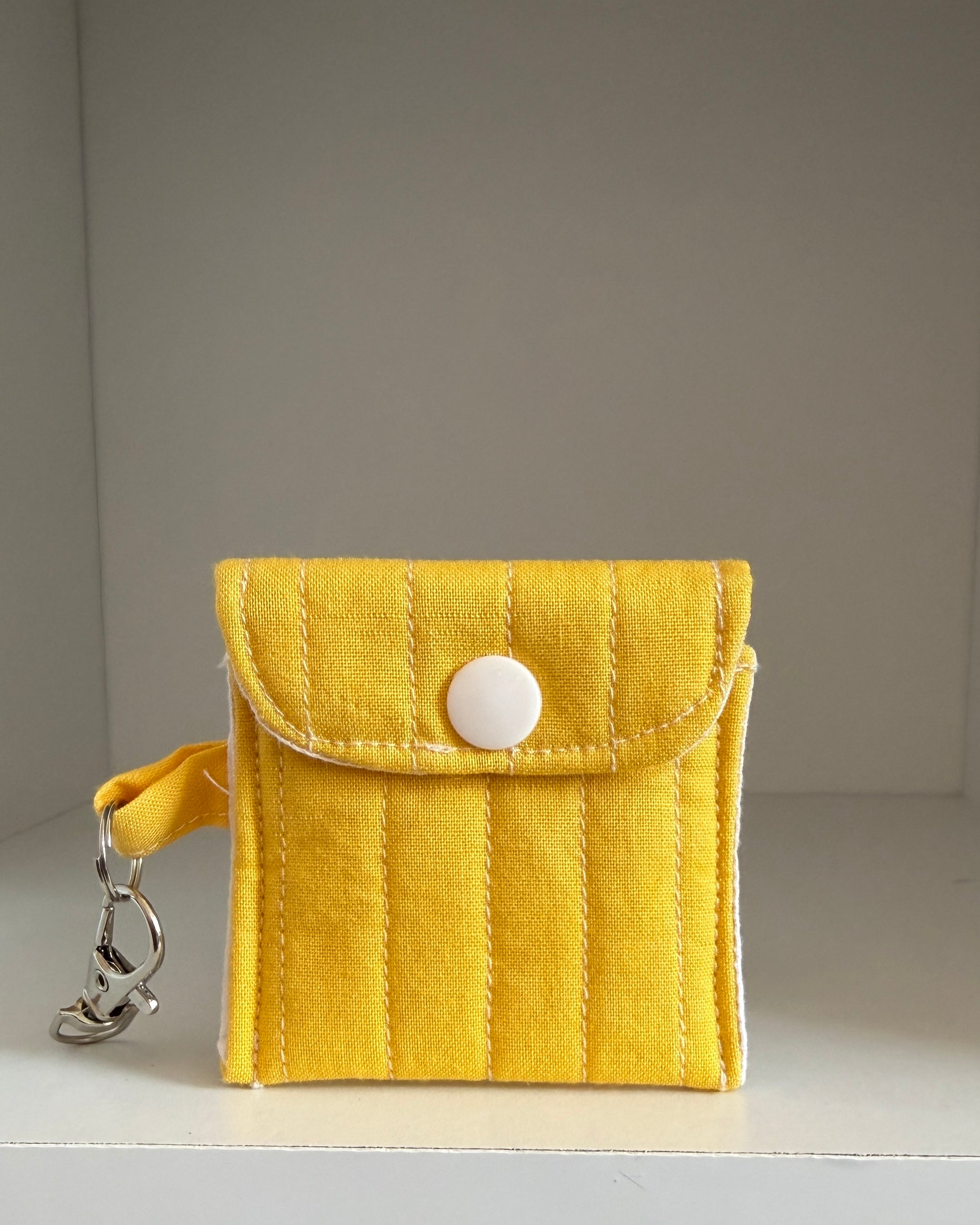 Yellow AirPods case